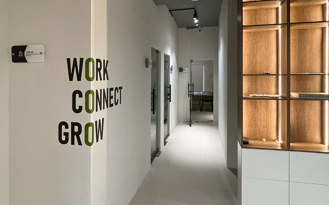 Plugin corridor with Work Connect Grow signage